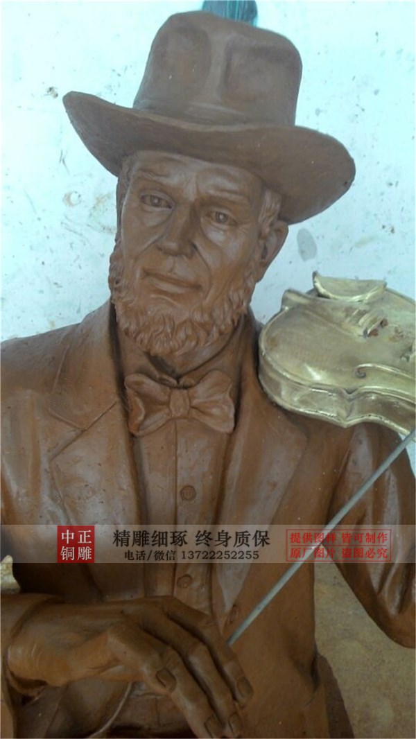 拉小提琴銅雕.jpg 拉小提琴銅雕.jpg